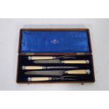 A MAPPIN AND WEBB FIVE PIECE IVORY HANDLE AND SILVER MOUNTED CARVING SET in oak case