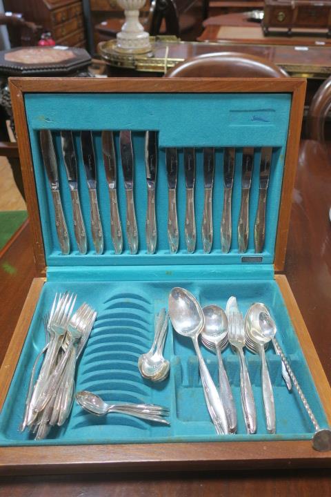 A FIFTY EIGHT PIECE FLEXFIT PLATED PART CANTEEN OF CUTLERY IN CASE