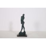AFTER AUGUSTE RODIN A GREEN PATINATED BRONZE FIGURE modelled as a male shown standing on a