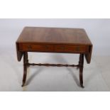 A GOOD YEW WOOD CROSS BANDED SOFA TABLE of rectangular outline the hinged top with two frieze