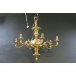A FINE PAIR OF 19TH CENTURY BRASS SIX BRANCH CHANDELIERS each with a bulbous and lobed column