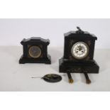 A 19TH CENTURY BLACK SLATE MANTEL CLOCK of architectural outline the rectangular case with enamel