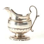 American Federal sterling silver milk jug by Andrew Osthoff,