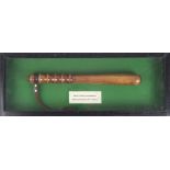 Royal Ulster Constabulary baton, in display case, 22¾" x 8¾" (55 x 22cm).