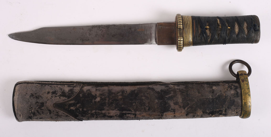 A Japanese tanto, the traditionally forged blade clipped towards the point, on gilt metal mounted,
