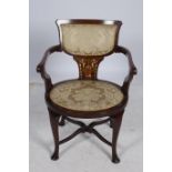A 19TH CENTURY MAHOGANY SATINWOOD AND BONE INLAID ELBOW CHAIR the shaped top rail with upholstered