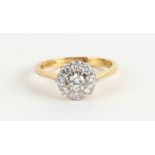 AN 18CT GOLD AND DIAMOND CLUSTER DRESS RING approx .