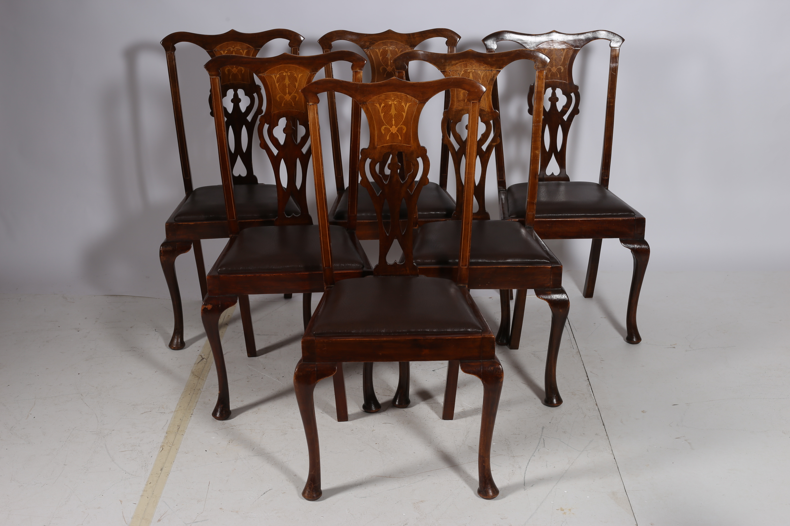 A SET OF SIX 19TH CENTURY MAHOGANY INLAID DINING CHAIRS each with a shaped top rail and pierced