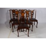 A SET OF SIX 19TH CENTURY MAHOGANY INLAID DINING CHAIRS each with a shaped top rail and pierced
