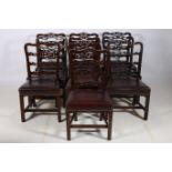A HARLEQUIN SET OF TEN 19TH CENTURY CHINESE CHIPPENDALE DESIGN MAHOGANY AND HIDE UPHOLSTERED DINING