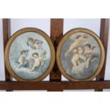 A PAIR OF LATE 19TH CENTURY WATERCOLOURS DEPICTING CHERUBS FROLICKING In oval giltwood frames