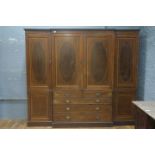 A GOOD 19TH CENTURY MAHOGANY AND SATINWOOD INLAID COMBINATION WARDROBE of breakfront outline the