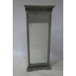 A CONTINENTAL GREY PAINTED MIRROR the rectangular plate within a moulded frame with foliate carved