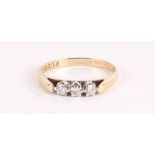 A 9CT THREE STONE DIAMOND DRESS RING