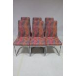 A SET OF SIX DESIGNER CHROME AND UPHOLSTERED DINING CHAIRS each with a rectangular shaped back and