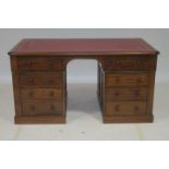 A 19TH CENTURY MAHOGANY PEDESTAL DESK