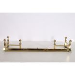 A BRASS TELESCOPIC FENDER the roped top rail joined by claw and ball finials raised on a moulded