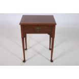 A GEORGIAN DESIGN MAHOGANY TABLE of rectangular outline with frieze drawer on cabriole legs with