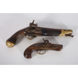 A NAVAL TYPE FLINTLOCK PISTOL with brass fittings together with an American style percussion pocket