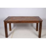 A RETRO HARDWOOD TABLE of rectangular outline the shaped planked top raised on square moulded legs