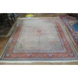 A BIDJAR WOOL RUG the multicoloured ground with central panel filled with stylized flowerheads