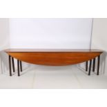 A GEORGIAN MAHOGANY HUNT TABLE the oval hinged top raised on square moulded legs 73cm (h) x 305cm