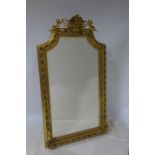 A CONTINENTAL GILTWOOD AND GESSO MIRROR the rectangular shaped bevelled glass plate within a