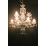 A CAVAN CUT GLASS EIGHT BRANCH CHANDELIER hung in two registers with scroll arms and drip pans hung
