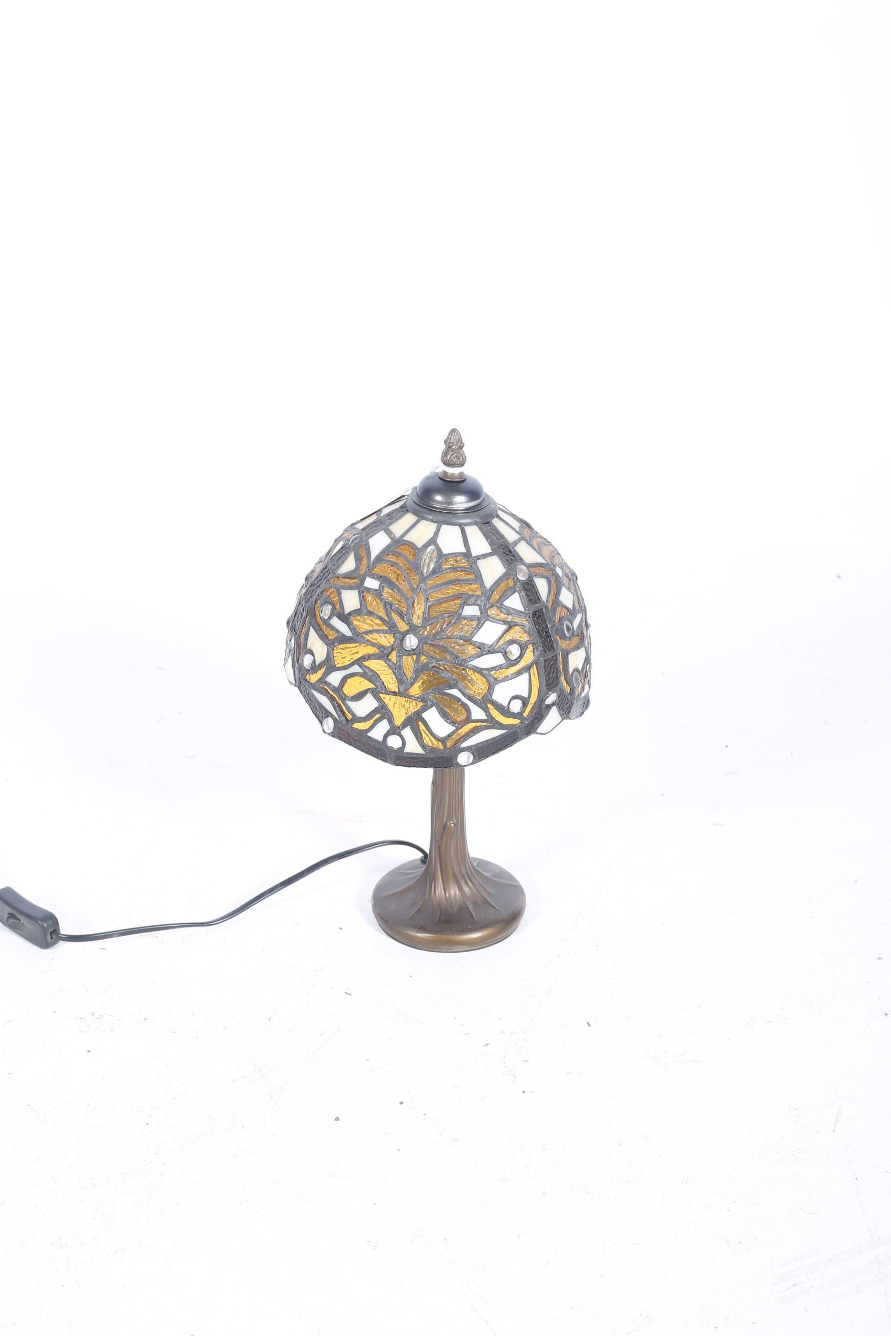 AN ART DECO DESIGN TABLE LAMP the multicoloured lead glass mushroom shaped shade above a