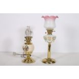 A 19TH CENTURY BRASS OIL LAMP the opaline floral embossed bowl above a cylindrical column with
