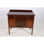 AN EDWARDIAN MAHOGANY INLAID SIDE CABINET of rectangular outline with frieze drawer and cupboard on