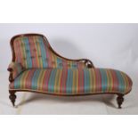 A 19TH CENTURY MAHOGANY CHAISE LONGUE the shaped top rail with button upholstered back and seat