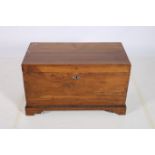 A 19TH CENTURY CAMPHOR WOOD CHEST of rectangular outline with hinged lid beadwork base on bracket