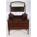 AN EDWARDIAN MAHOGANY INLAID DRESSING CHEST the superstructure with bevelled glass mirror above two