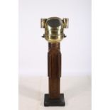 A VINTAGE SHIP'S BINNACLE raised on a hardwood stand with square moulded base 152cm x 38cm