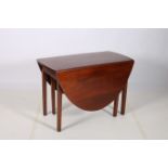 A GEORGIAN DESIGN MAHOGANY DROP LEAF TABLE the oval hinged top raised on square moulded legs 73cm