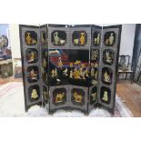 A VERY FINE JAPANESE BLACK LACQUERED SIX FOLD SCREEN each panel overlaid with jade figures flower