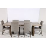 A SEVEN PIECE CONTEMPORARY DINING ROOM SUITE comprising six chairs each with an upholstered back