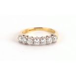 A FINE 18CT GOLD SEVEN STONE DIAMOND DRESS RING G/F colour V/S/2 clarity