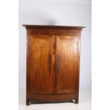 AN 18TH CENTURY FRENCH OAK ARMOIRE the moulded cornice above a pair of panelled doors containing
