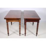 A PAIR OF 19TH CENTURY MAHOGANY FOLD OVER TEA TABLES each of rectangular outline the shaped top