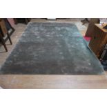 A JACARANDA HAND WOVEN GREEN GROUND WOOL RUG 250cm x 350cm