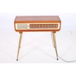 A RETRO PIANOGRAM lll in a teak veneered case on metal tapering legs 75cm (h) x 77cm (w) x 40cm (d)