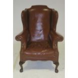 A GOOD GEORGIAN DESIGN MAHOGANY HIDE UPHOLSTERED WING CHAIR