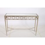 A CONTINENTAL GILT METAL CONSOLE TABLE of rectangular outline with mottled glazed inset above a