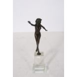 A BRONZE FIGURE modelled as a female shown standing on one leg with out stretched arms raised on a