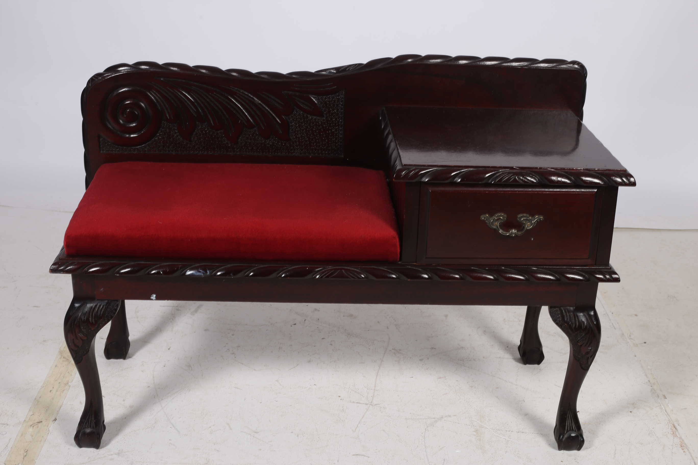 A CHIPPENDALE DESIGN MAHOGANY TELEPHONE SEAT with upholstered seat and frieze drawer on cabriole