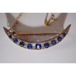 15ct. gold sapphire / diamond crescent brooch set in gold - length 5 cm