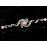 Sapphire, diamond and half pearl bar brooch set in white metal, probably platinum. Pearls to each