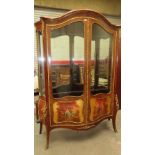 French Vernis Martin style bombe shaped display cabinet with mirrored back, gilt metal mounts and